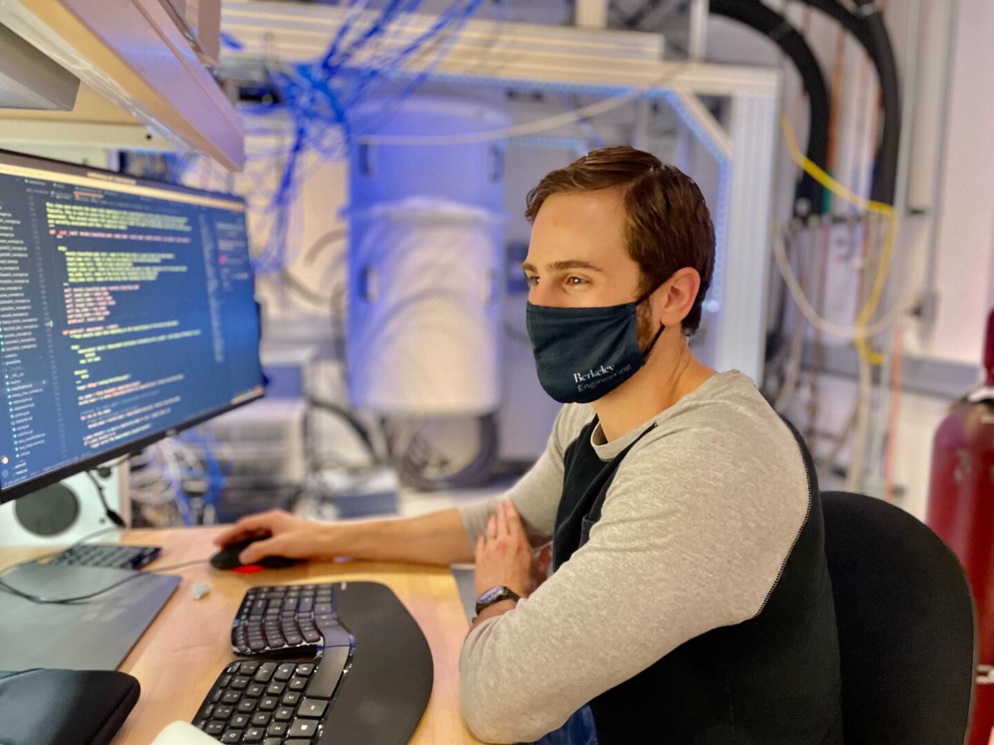 AQT researcher Akel Hashim working on room temperature electronic control systems for superconducting quantum processors (Credit: Christian Jünger/Berkeley Lab)