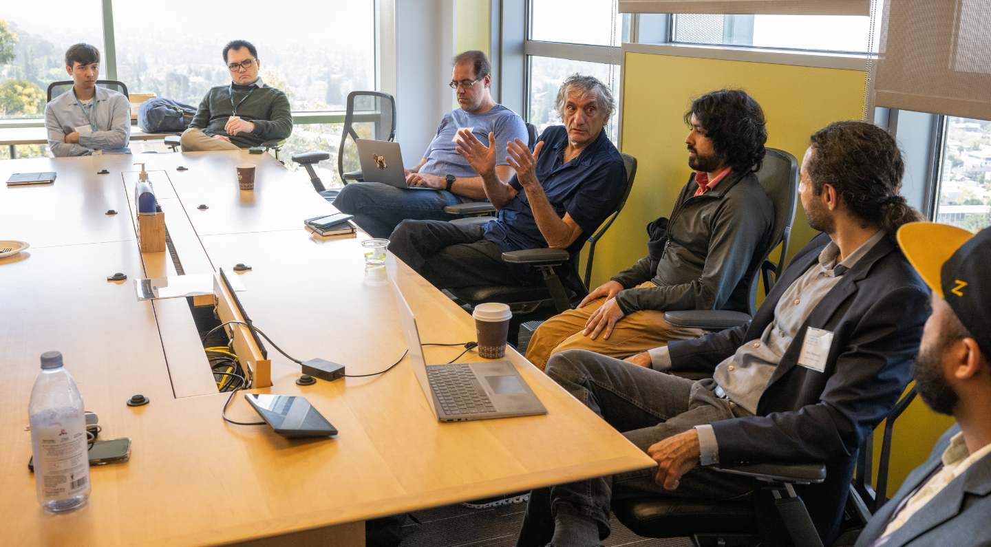 AQT Summit, Day 2, Hardware Breakout session. Researchers from left to right: Trevor Chistolini (UC Berkeley), Long Nguyen (Berkeley Lab), Wim Lavrijsen (Berkeley Lab), John Martinis (UC Santa Barbara and Qolab Inc), Neelay Fruitwala (Berkeley Lab), Kasra Nowrouzi (Berkeley Lab), and Ravi Naik (Berkeley Lab)